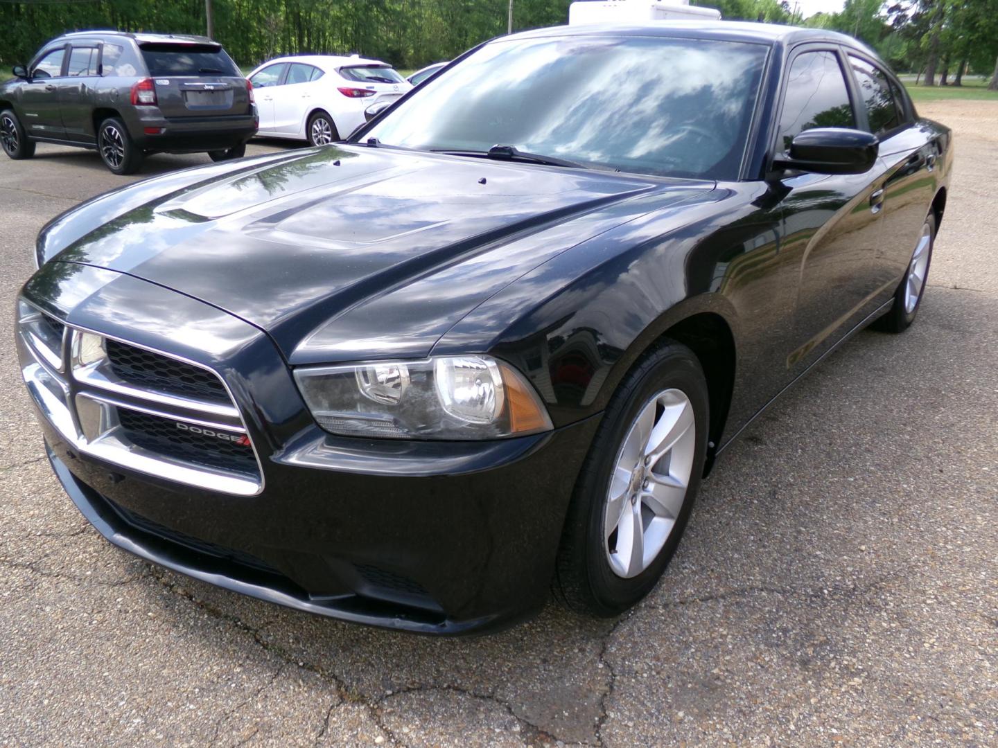 2014 Black /Black Dodge Charger SE (2C3CDXBG2EH) with an 3.6L V6 DOHC 24V engine, 5-Speed Automatic transmission, located at 400 First NW, Bearden, AR, 71720, (870) 687-3414, 0.000000, 0.000000 - Photo#0