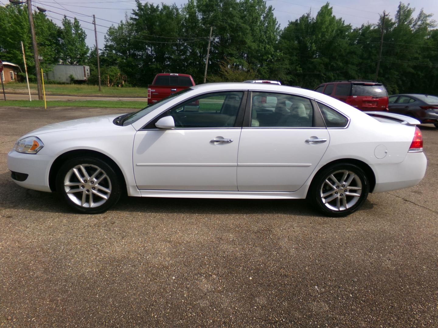 2016 Olympic White /Tan Chevrolet Impala Limited LTZ (2G1WC5E37G1) with an 3.6L V6 DOHC 16V FFV engine, 6-speed automatic transmission, located at 400 First NW, Bearden, AR, 71720, (870) 687-3414, 0.000000, 0.000000 - Photo#16