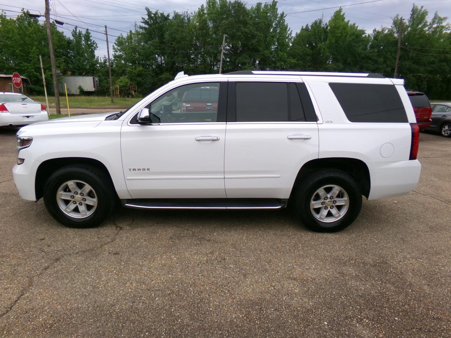 2016 White /Tan Chevrolet Tahoe LTZ 4WD (1GNSKCKC4GR) with an 5.3L V8 OHV 16V engine, 6-speed automatic transmission, located at 400 First NW, Bearden, AR, 71720, (870) 687-3414, 0.000000, 0.000000 - Photo#1