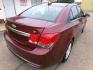 2015 Autumn Bronze Metallic /Black Chevrolet Cruze 1LT Auto (1G1PC5SBXF7) with an 1.4L L4 DOHC 16V TURBO engine, 6-Speed Automatic transmission, located at 400 First NW, Bearden, AR, 71720, (870) 687-3414, 0.000000, 0.000000 - Photo#19