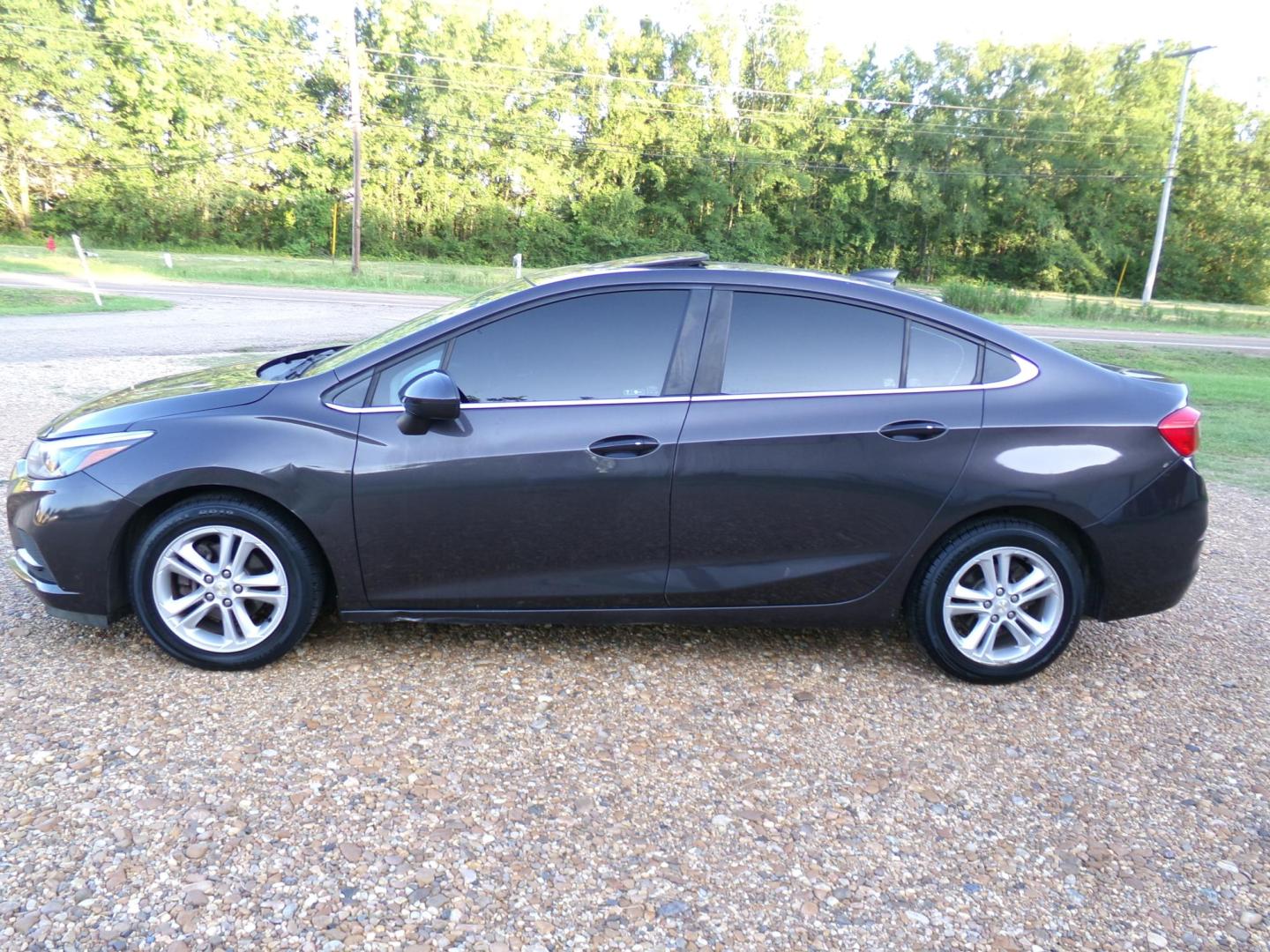 2016 Carbon Flash Metallic /Black Chevrolet Cruze LT Auto (1G1BE5SM4G7) with an 1.4L L4 DOHC 16V TURBO engine, 6-Speed Automatic transmission, located at 400 First NW, Bearden, AR, 71720, (870) 687-3414, 0.000000, 0.000000- Photo#1