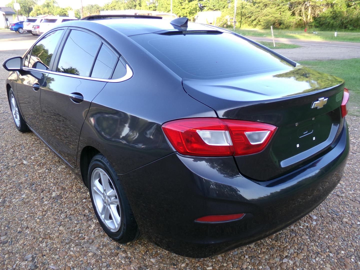 2016 Carbon Flash Metallic /Black Chevrolet Cruze LT Auto (1G1BE5SM4G7) with an 1.4L L4 DOHC 16V TURBO engine, 6-Speed Automatic transmission, located at 400 First NW, Bearden, AR, 71720, (870) 687-3414, 0.000000, 0.000000- Photo#2