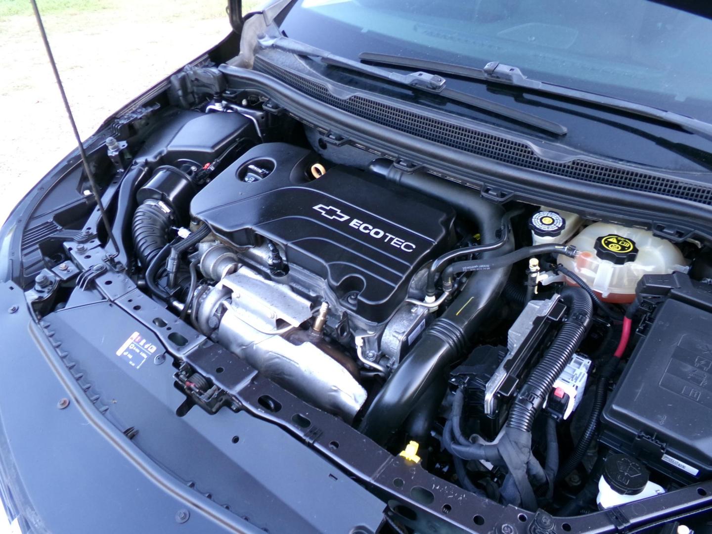 2016 Carbon Flash Metallic /Black Chevrolet Cruze LT Auto (1G1BE5SM4G7) with an 1.4L L4 DOHC 16V TURBO engine, 6-Speed Automatic transmission, located at 400 First NW, Bearden, AR, 71720, (870) 687-3414, 0.000000, 0.000000- Photo#5