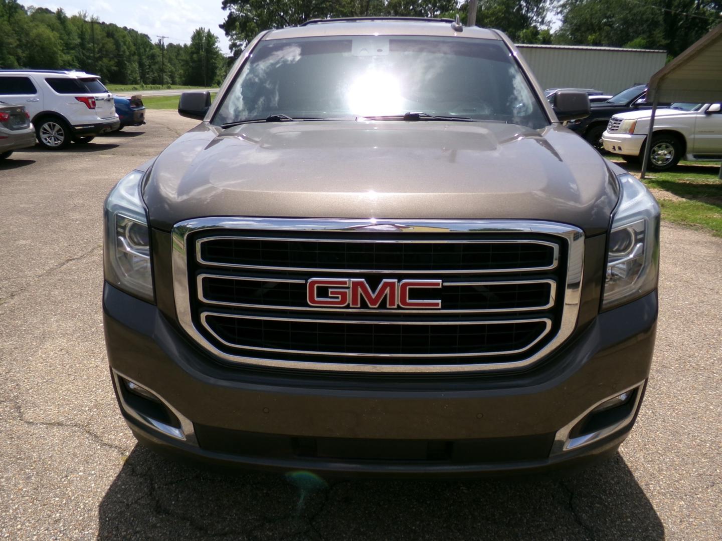 2015 Subterranean Metallic /Brown GMC Yukon SLT 2WD (1GKS1BKC8FR) with an 5.3L V8 OHV 16V engine, 6-Speed Automatic transmission, located at 400 First NW, Bearden, AR, 71720, (870) 687-3414, 0.000000, 0.000000- Photo#29