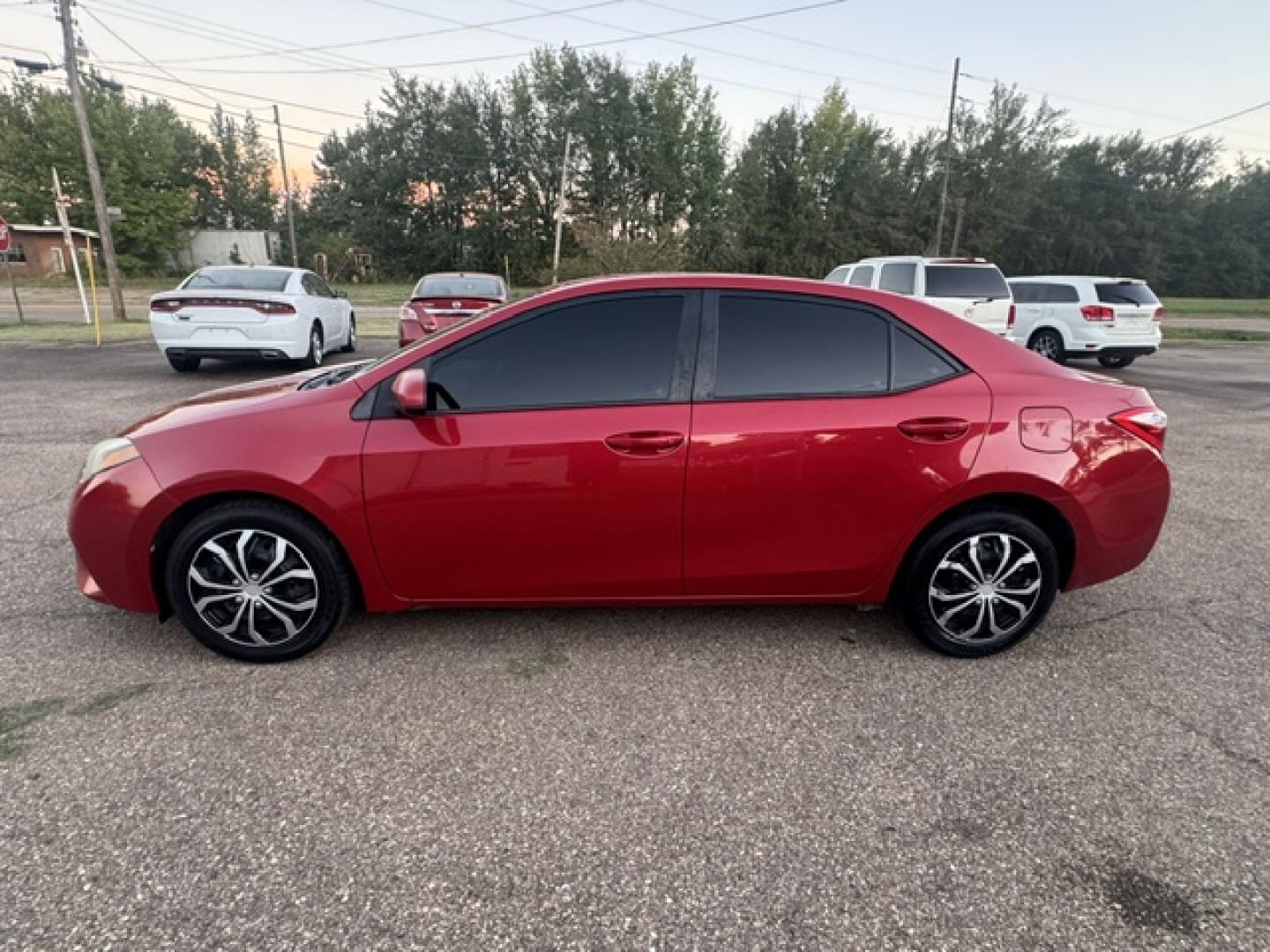 2016 Barcelona Red Metallic /Tan Toyota Corolla L 4-Speed AT (2T1BURHE2GC) with an 1.8L L4 DOHC 16V engine, 4-Speed Automatic Overdrive transmission, located at 400 First NW, Bearden, AR, 71720, (870) 687-3414, 0.000000, 0.000000- Photo#1