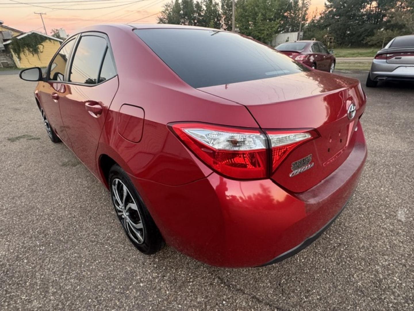 2016 Barcelona Red Metallic /Tan Toyota Corolla L 4-Speed AT (2T1BURHE2GC) with an 1.8L L4 DOHC 16V engine, 4-Speed Automatic Overdrive transmission, located at 400 First NW, Bearden, AR, 71720, (870) 687-3414, 0.000000, 0.000000- Photo#2