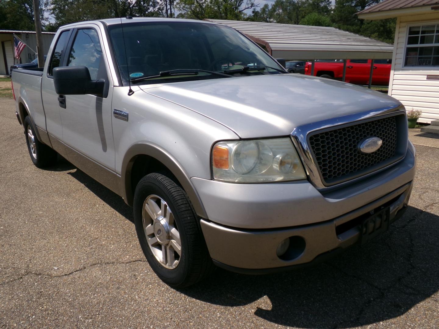 2006 Smokestone Metallic /Tan Ford F-150 Lariat SuperCab 2WD (1FTPX12576F) with an 5.4L V8 SOHC 16V engine, 4-Speed Automatic Overdrive transmission, located at 400 First NW, Bearden, AR, 71720, (870) 687-3414, 0.000000, 0.000000- Photo#0