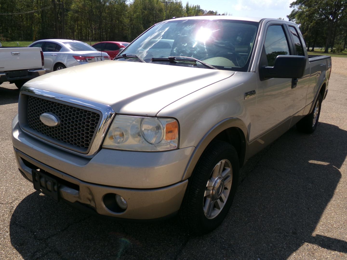 2006 Smokestone Metallic /Tan Ford F-150 Lariat SuperCab 2WD (1FTPX12576F) with an 5.4L V8 SOHC 16V engine, 4-Speed Automatic Overdrive transmission, located at 400 First NW, Bearden, AR, 71720, (870) 687-3414, 0.000000, 0.000000- Photo#20