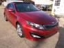 2011 Spicy Red Metallic /Black Kia Optima SX (KNAGR4A60B5) with an 2.4L L4 DOHC 16V TURBO engine, 6-Speed Automatic transmission, located at 401 First NE, Bearden, AR, 71720, (870) 687-3414, 33.726528, -92.611519 - Photo#25